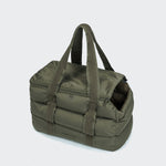 CLOUD7_ The Hundetasche Montreal Light Olive is a large, padded olive green dog bag with two long handles and a zippered main compartment, ideal as a Tragetasche für kleine Hunde, shown on a light gray background.