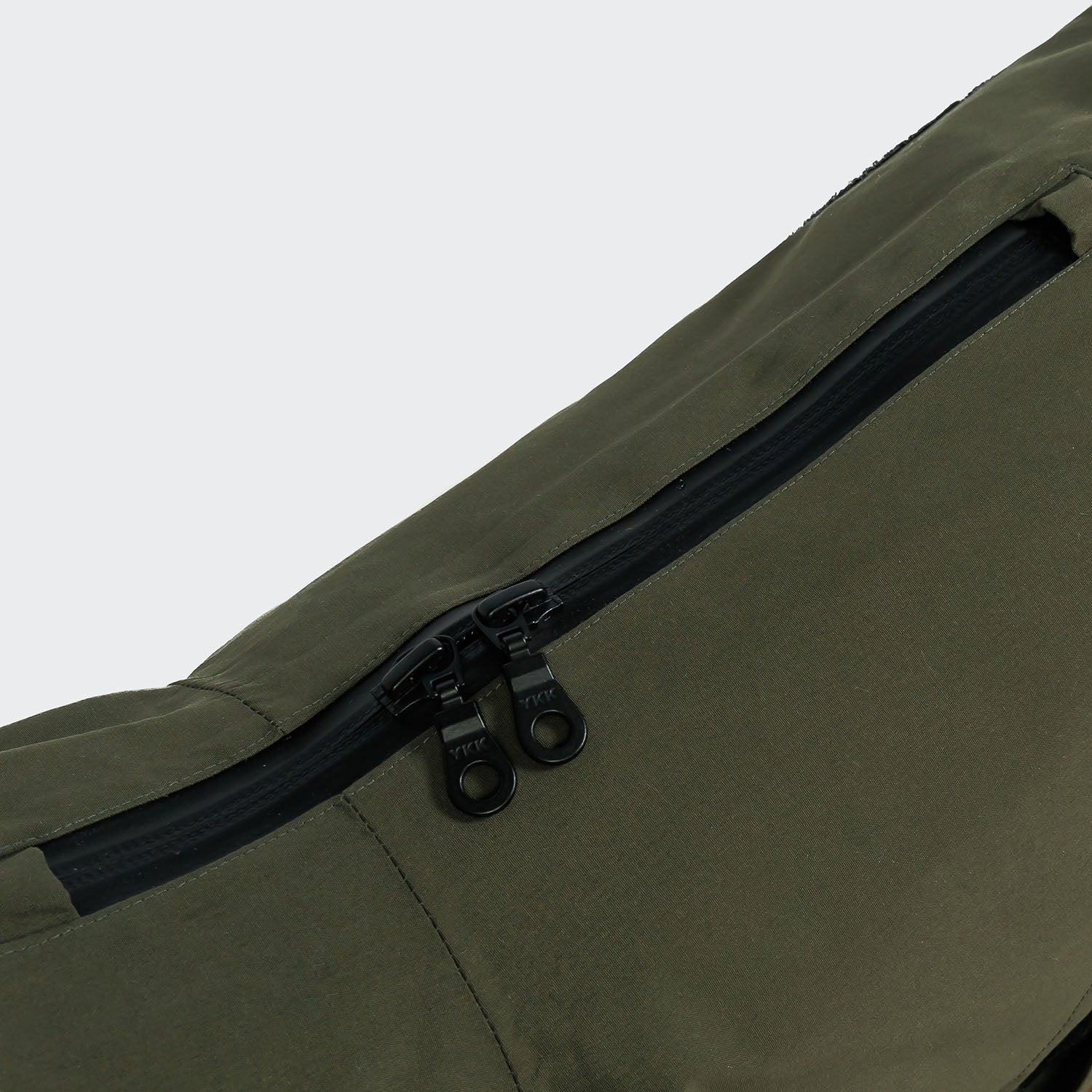 Detail image of dog raincoat in dark green